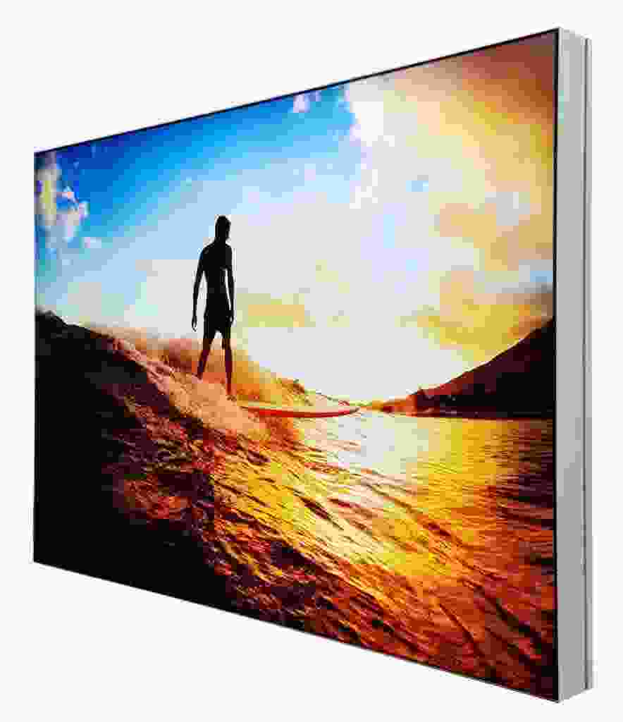 Sunset image displayed on a framless fabric backlit frame